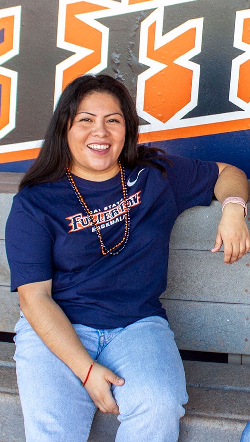 Student wearing women's apparel