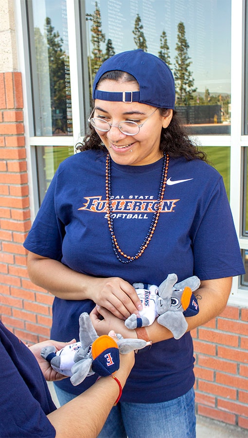 Student wearing women's apparel